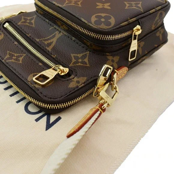 LOUIS VUITTON Utility Phone Sleeve Monogram Canvas Crossbody Bag - Picture 5 of 11